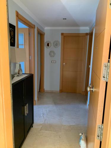 a room with a hallway with a door and a room with a hallway at Residencial Duquesa Fase 1 in Manilva