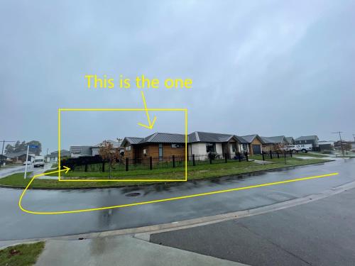 a picture of a street with a yellow line at Cozy 2- Bedrooms Unit In Hamilton in Hamilton