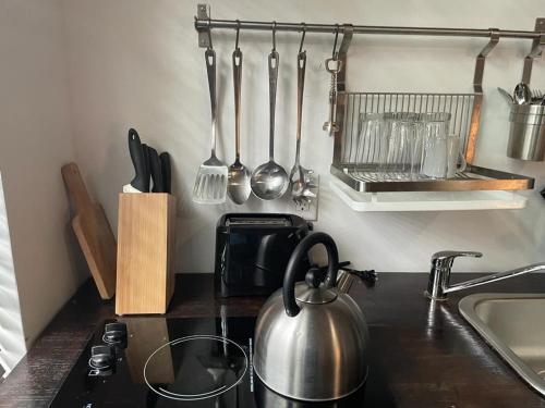 Dapur atau dapur kecil di Vive Zen Queen Room