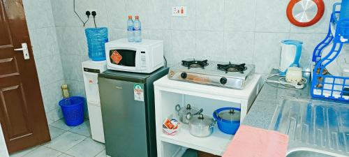 Kuchyň nebo kuchyňský kout v ubytování EuphGlory Accomodations 1 bedroom