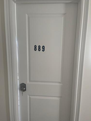 a door with a number on it in a room at Unwind Here in a Stylish and Cozy Space in Bradford