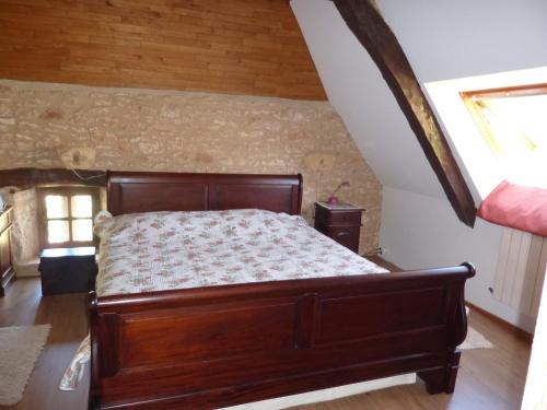 Ліжко або ліжка в номері Le Domaine de Loupiac