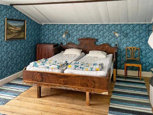 Postel nebo postele na pokoji v ubytování Holiday home LAMMHULT, SVERIGE II