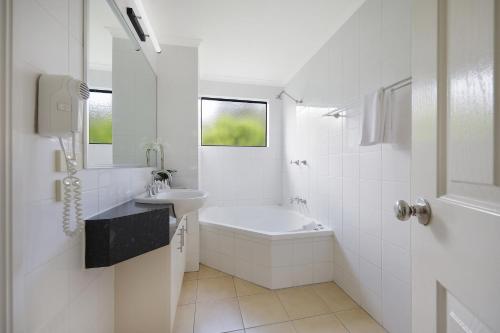 Un baño de Sea Foam Villas
