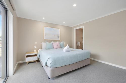 Cama o camas de una habitación en Sea Foam Villas