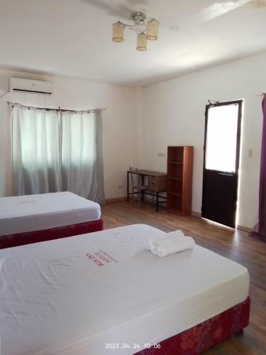 Postel nebo postele na pokoji v ubytování Wjv Inn Sta. Fe Bantayan