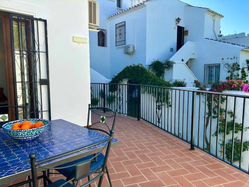 Casa con terraza y hermoso jardín comunal