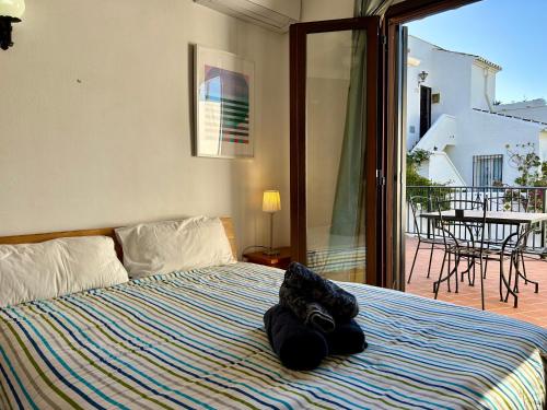 Casa con terraza y hermoso jardín comunal