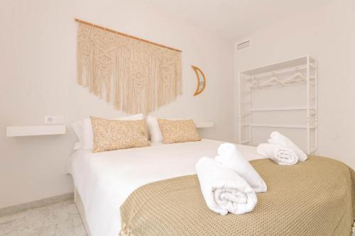 Postel nebo postele na pokoji v ubytování Casa Aya en Centro Cordoba
