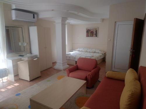 Ένα ή περισσότερα κρεβάτια σε δωμάτιο στο Hotel Zora