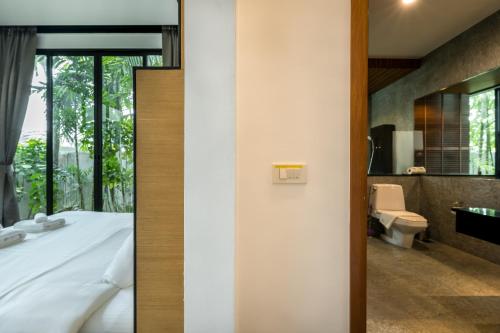 Ένα μπάνιο στο Baan Bua BT17 by Villacarte