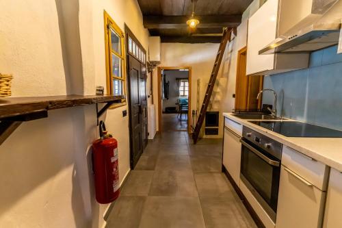 a kitchen with a fire hydrant in the middle of it at GORIČKE IŽE in Križevci