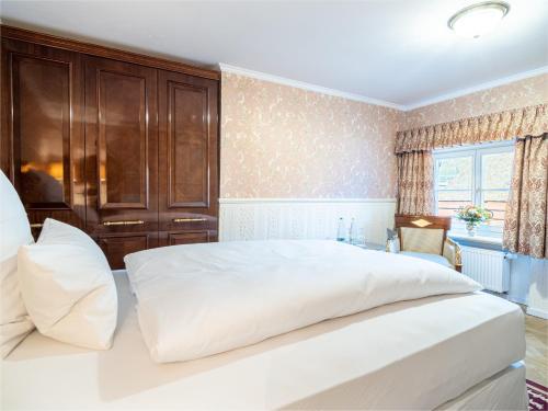 Ein Bett oder Betten in einem Zimmer der Unterkunft Schloss Frankenberg