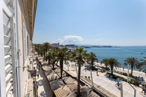 a view of the beach and the ocean from a building at B&B Skyfall in Split