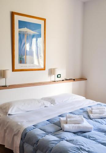 Ένα ή περισσότερα κρεβάτια σε δωμάτιο στο Agriturismo biologico Bulichella