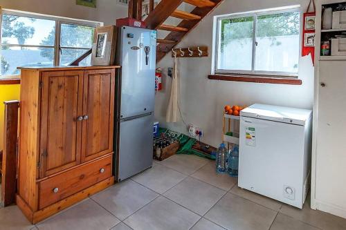 a kitchen with two refrigerators and a refrigerator at The Boathouse in Velddrif