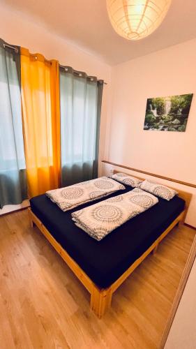 Postel nebo postele na pokoji v ubytování Blue Sun
