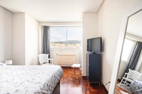 En eller flere senge i et værelse på Apartamento en el centro de Ourense