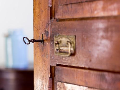 an open wooden door with a metal door knob at Casa Della Torre In Borgo Medievale in Stroncone