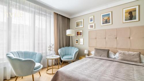 Una cama o camas en una habitación de hvile 149 Gdańsk - prywatne miejsce parkingowe