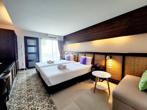 Katil atau katil-katil dalam bilik di Nordwind Hotel