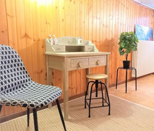 a table with a sink and a chair in a room at Large flat in the hills of Menaggio in Menaggio