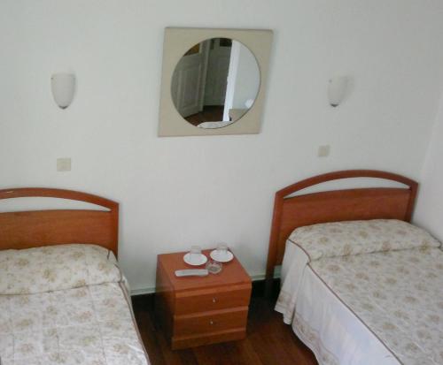 Voodi või voodid majutusasutuse Pension Martinez toas