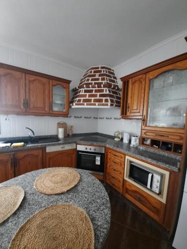 Köök või kööginurk majutusasutuses Mi Piriposa
