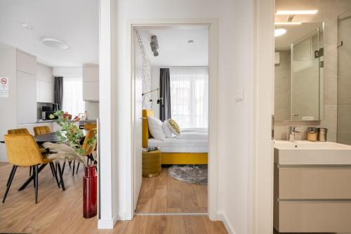 a small apartment with a bedroom and a bathroom at Rose Garden Residence - Boutique Apartments in City Center in Budapest