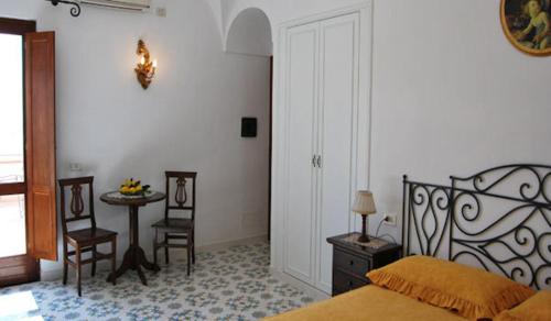 Ένα ή περισσότερα κρεβάτια σε δωμάτιο στο Villamena