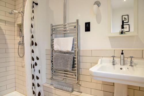Ένα μπάνιο στο Stainsborough Hall Holiday Cottages