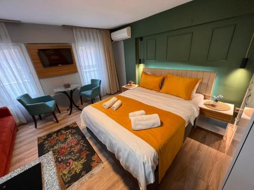 Postel nebo postele na pokoji v ubytování Holy Galata Hotel
