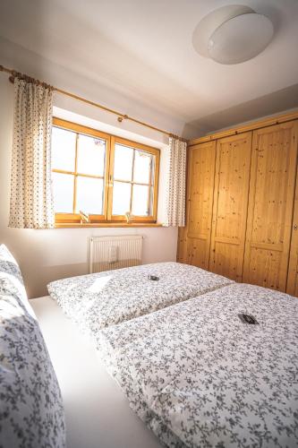 Chalet Obenland Kitzbühler Alpenにあるベッド