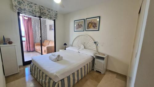 Postel nebo postele na pokoji v ubytování Apartamento Edificio Trinisol II 5