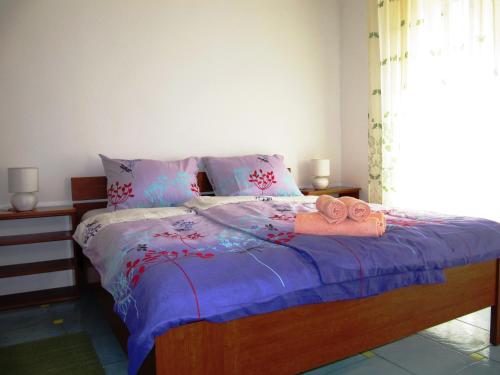 Katil atau katil-katil dalam bilik di Apartment Anita 1