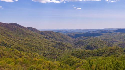 an aerial view of a mountain valley with trees at Grandview Getaway in Boone