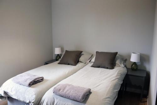 Ліжко або ліжка в номері Coastal Eco-Lodge