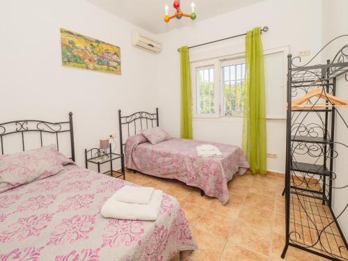 Ένα ή περισσότερα κρεβάτια σε δωμάτιο στο Cubo's Casa Fernando