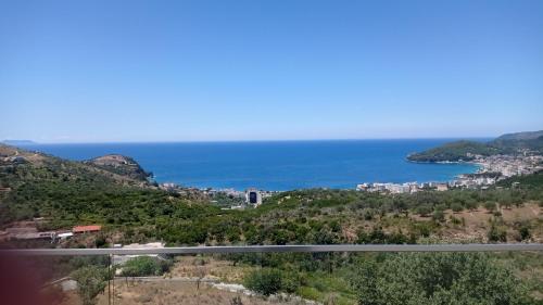 a view of the ocean from a highway at ELÉA Guesthouse himare in Himare