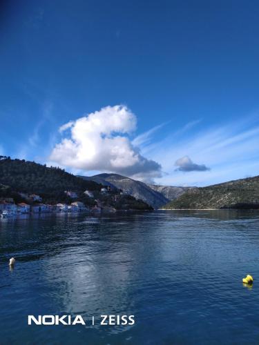 a view of a river with mountains in the background at BARRACKS 1856 in Vathi, Ithaka