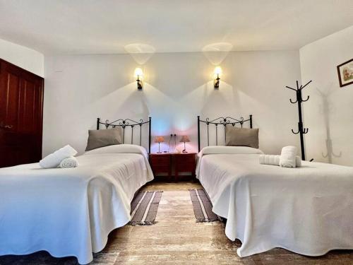 Ένα ή περισσότερα κρεβάτια σε δωμάτιο στο Casa Rural Alfavila