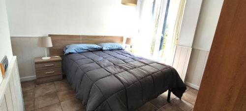 Katil atau katil-katil dalam bilik di Apartamento limonero ,VUT AL 13044