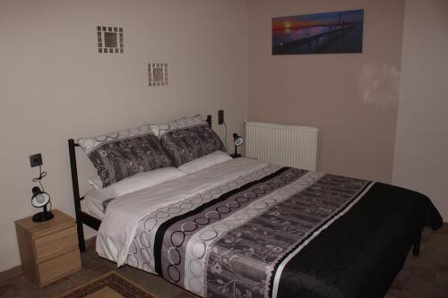 a bedroom with a large bed in a room at apartment to nature B in Ámmos