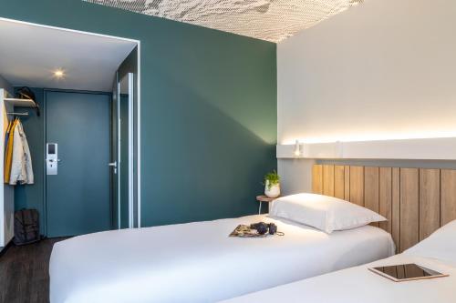 Cama o camas de una habitación en ibis Paris Nation Davout