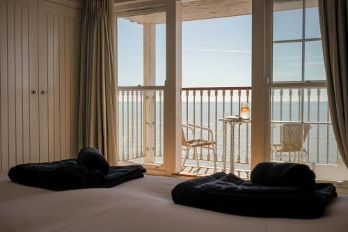 ヴェントナーにあるThe Wight Rivieraのベッドルーム1室(ベッド1台付)が備わります。