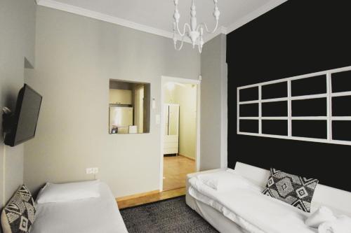 Posteľ alebo postele v izbe v ubytovaní Seven Seconds Away Apartment