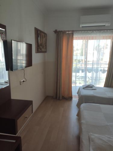 Postel nebo postele na pokoji v ubytování Wassermann Hotel