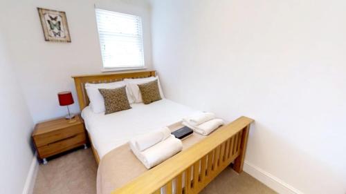 Voodi või voodid majutusasutuse Signet Apartments - Coronation House toas