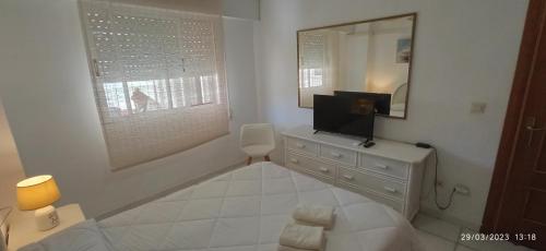 Apartamento Aquarium Park, 1ª linea de playa, piscina privada, aire acondicionado y wifi de alta velocidad
