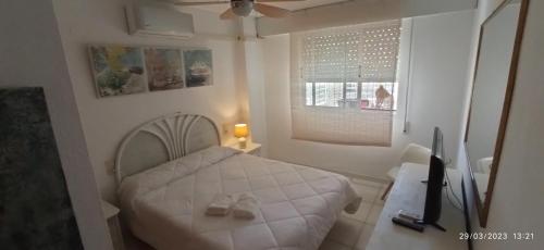 Apartamento Aquarium Park, 1ª linea de playa, piscina privada, aire acondicionado y wifi de alta velocidad